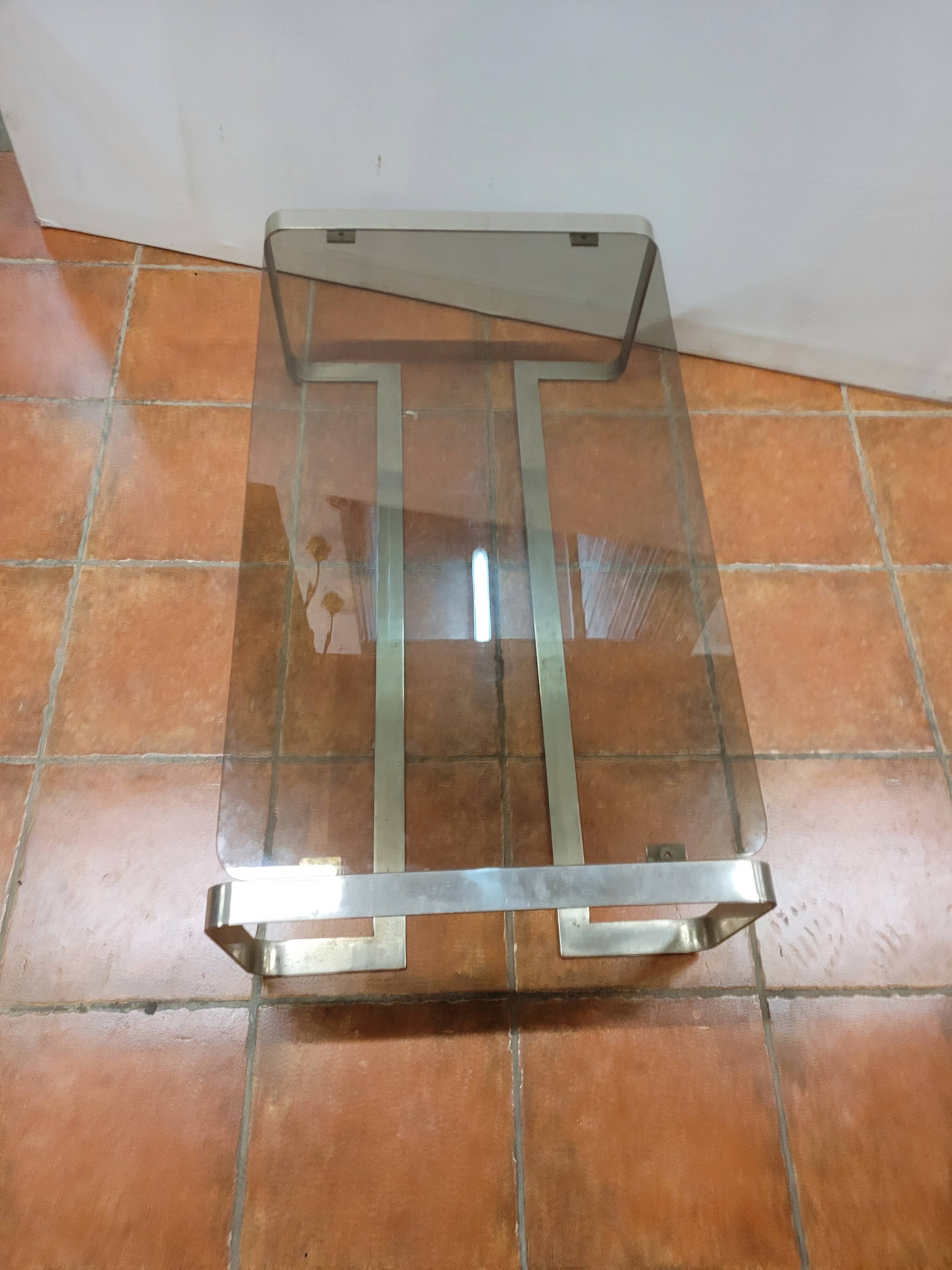 Coffee table with stainless steel base and smoked glass, from the 70s