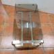 Coffee table with stainless steel base and smoked glass, from the 70s