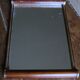 Rectangular mirror tray with wooden handles and gilding.