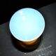 Ancient opaline white glass goblet with a soap bubble effect.