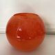 Vase boule en pâte de verre orange veiné,vintage 70 s