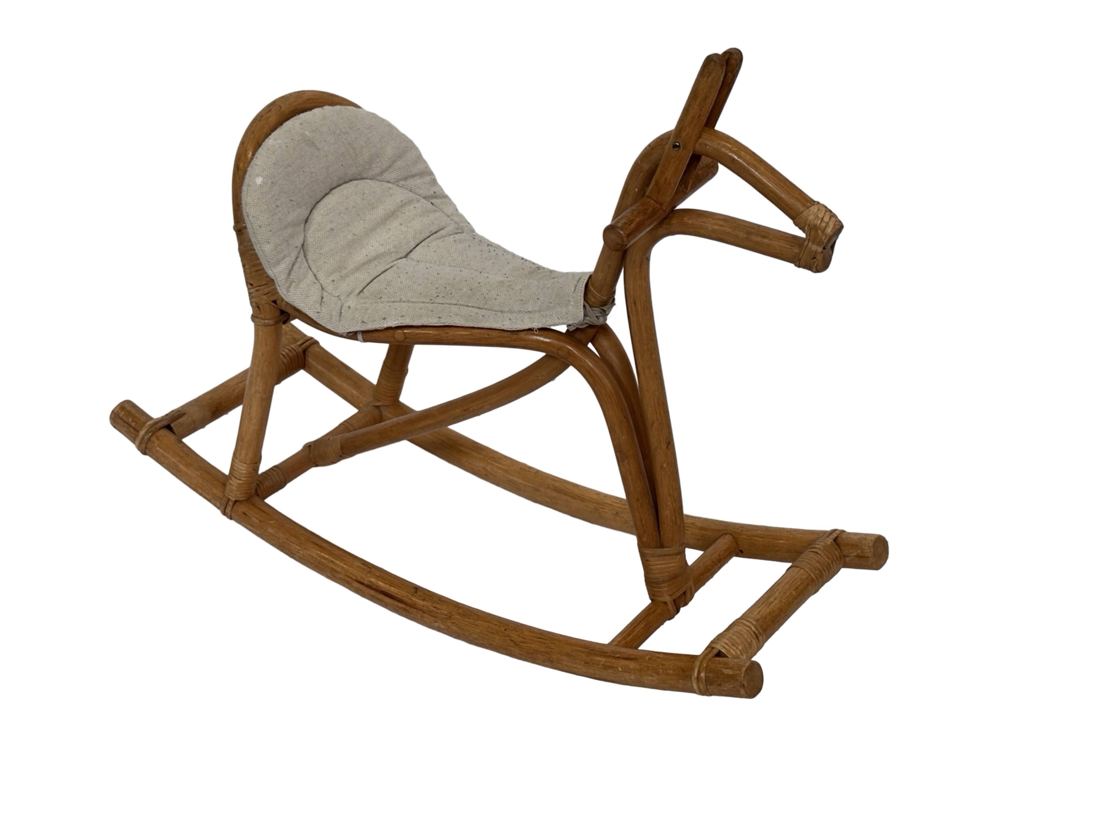 Vintage rattan rocking horse for a 1960s nursery design