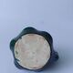 Green ceramic candlestick holder