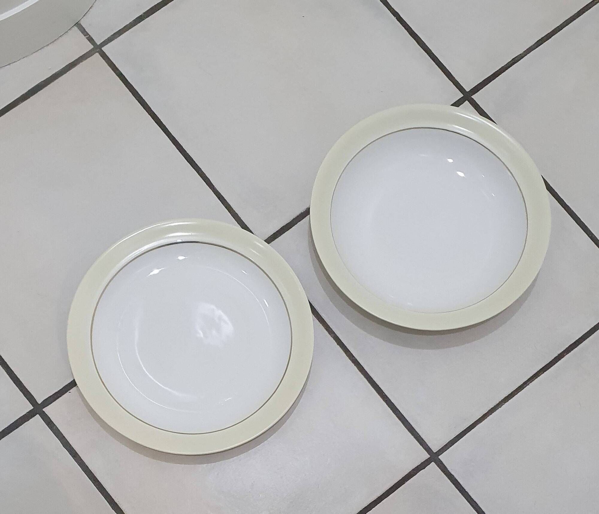White and yellow porcelain dinner service with gold edging, Poral Limoges France