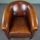 Club armchair in sheepskin with black piping