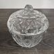 Antique covered jar in chiseled glass