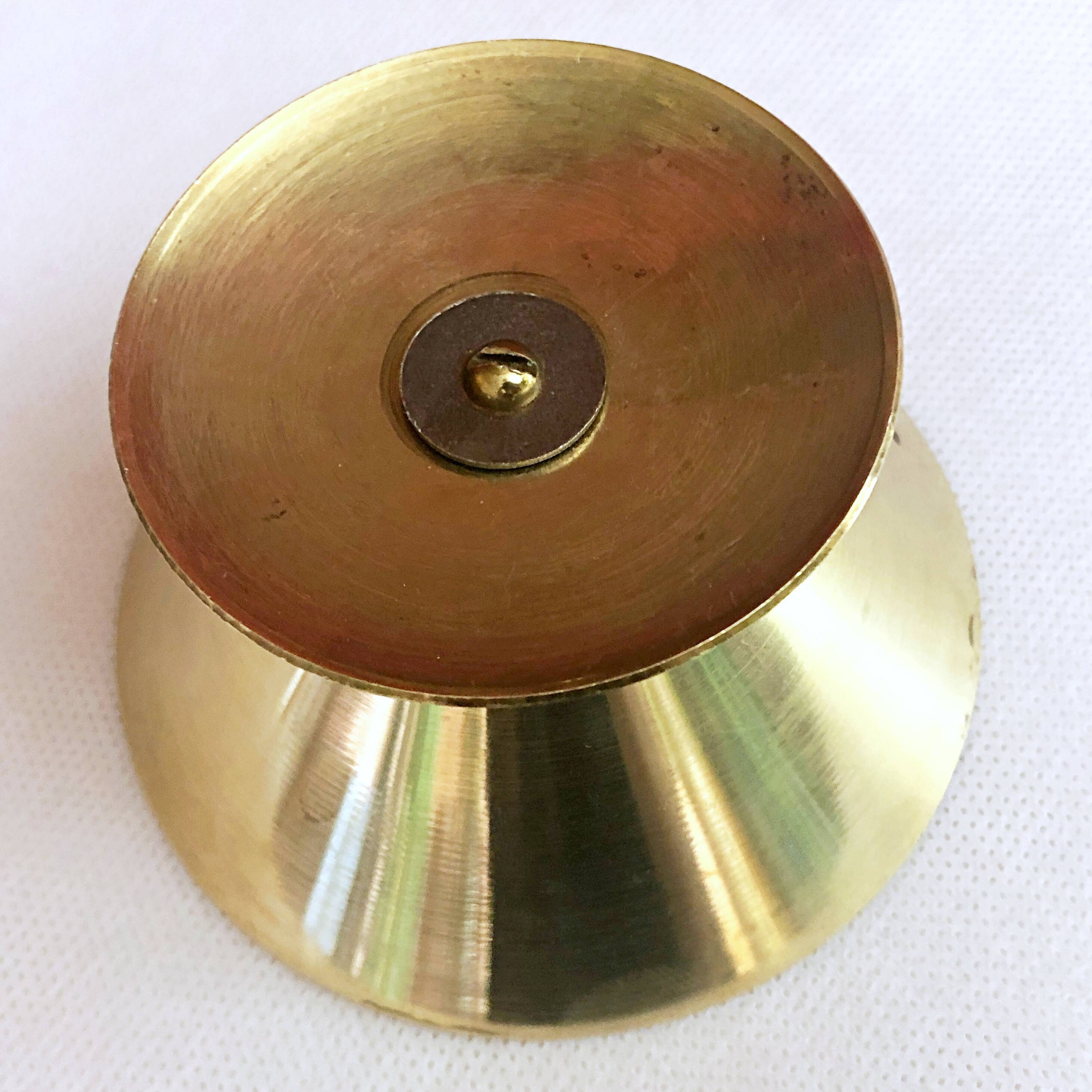 Table candle holder in golden brass