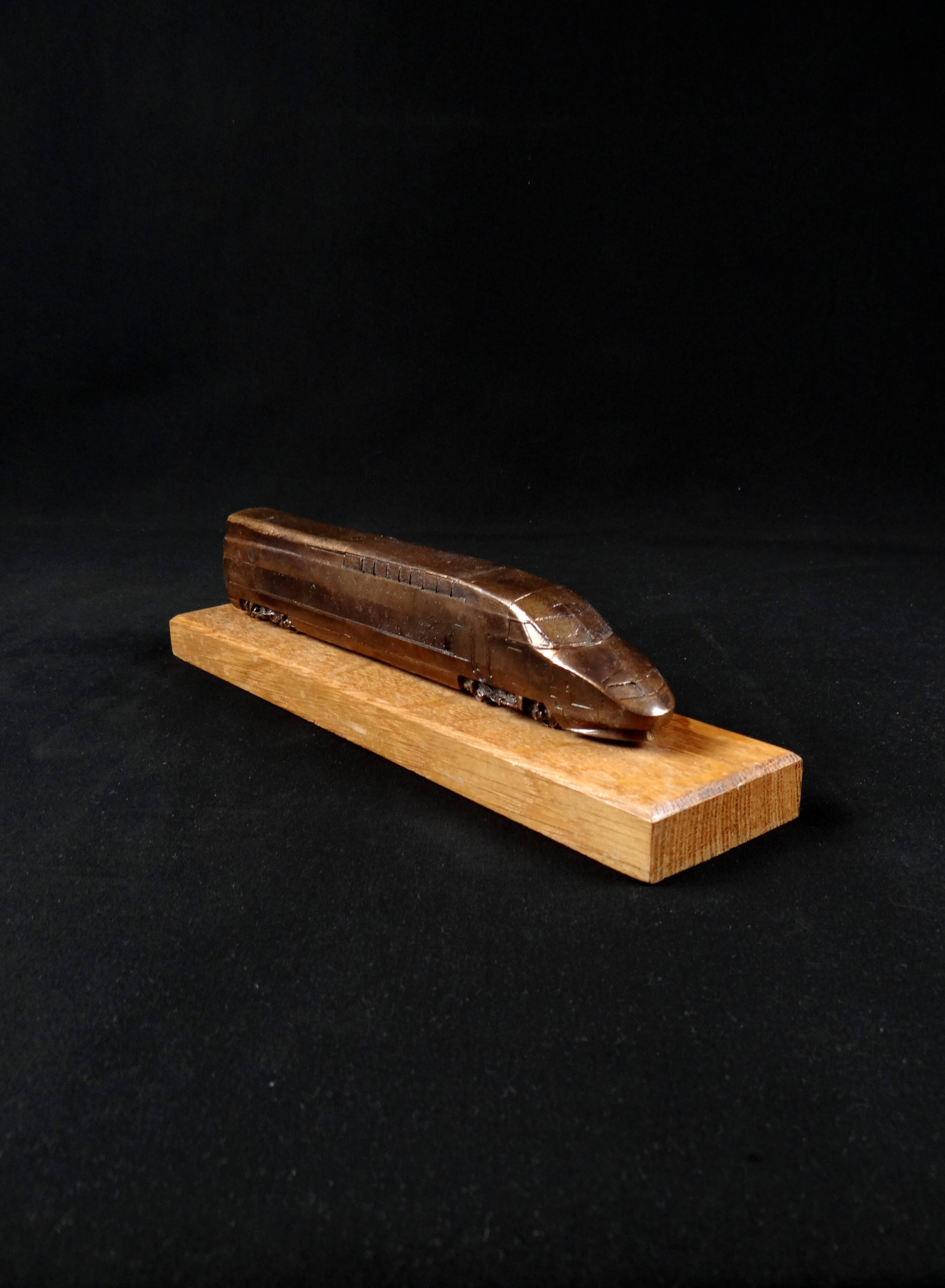 Bronze TGV on a wooden base, scale model of the TGV Sud-Est from the 1980s