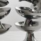 6 silver-plated metal bowls.