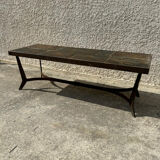Coffee table with stone top and iron legs