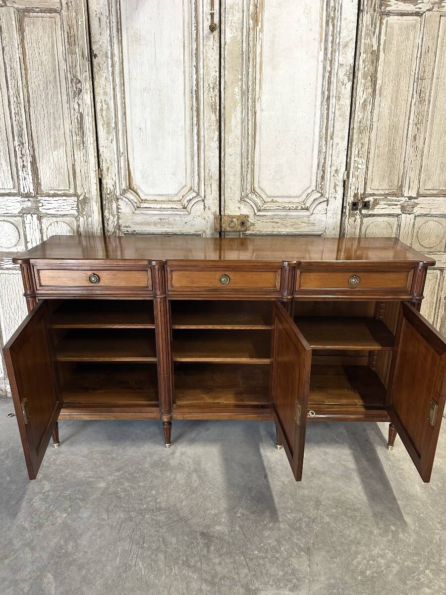 Louis XVI style enfilade in cherry wood, 20th century.