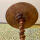 Carved wooden pedestal table