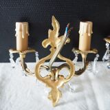 Pair of gilded bronze sconces and crystal pendants