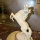 White rearing horse statuette