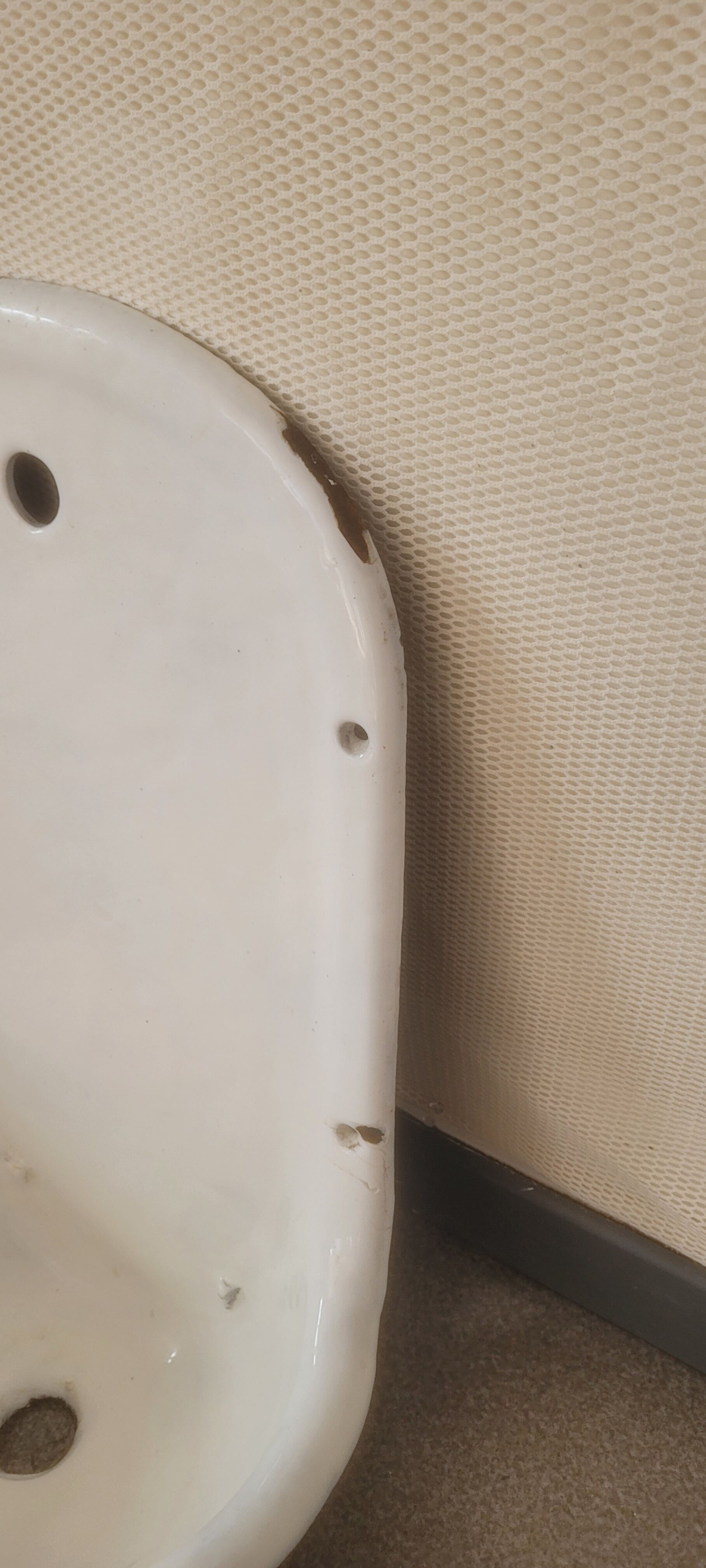 Old wall fountain washbasin