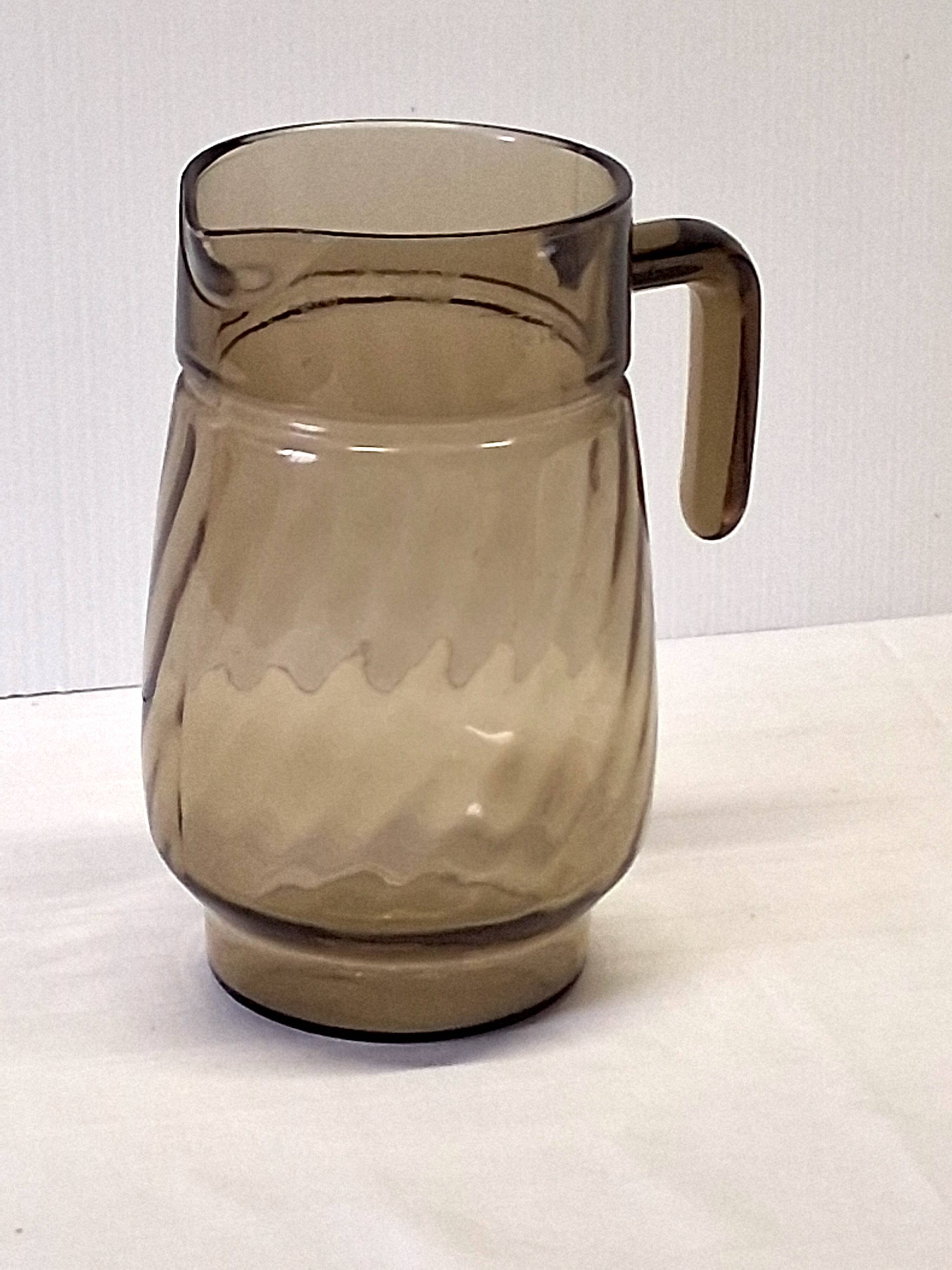 Very pretty black smoked glass pitcher from Lever in very good condition.