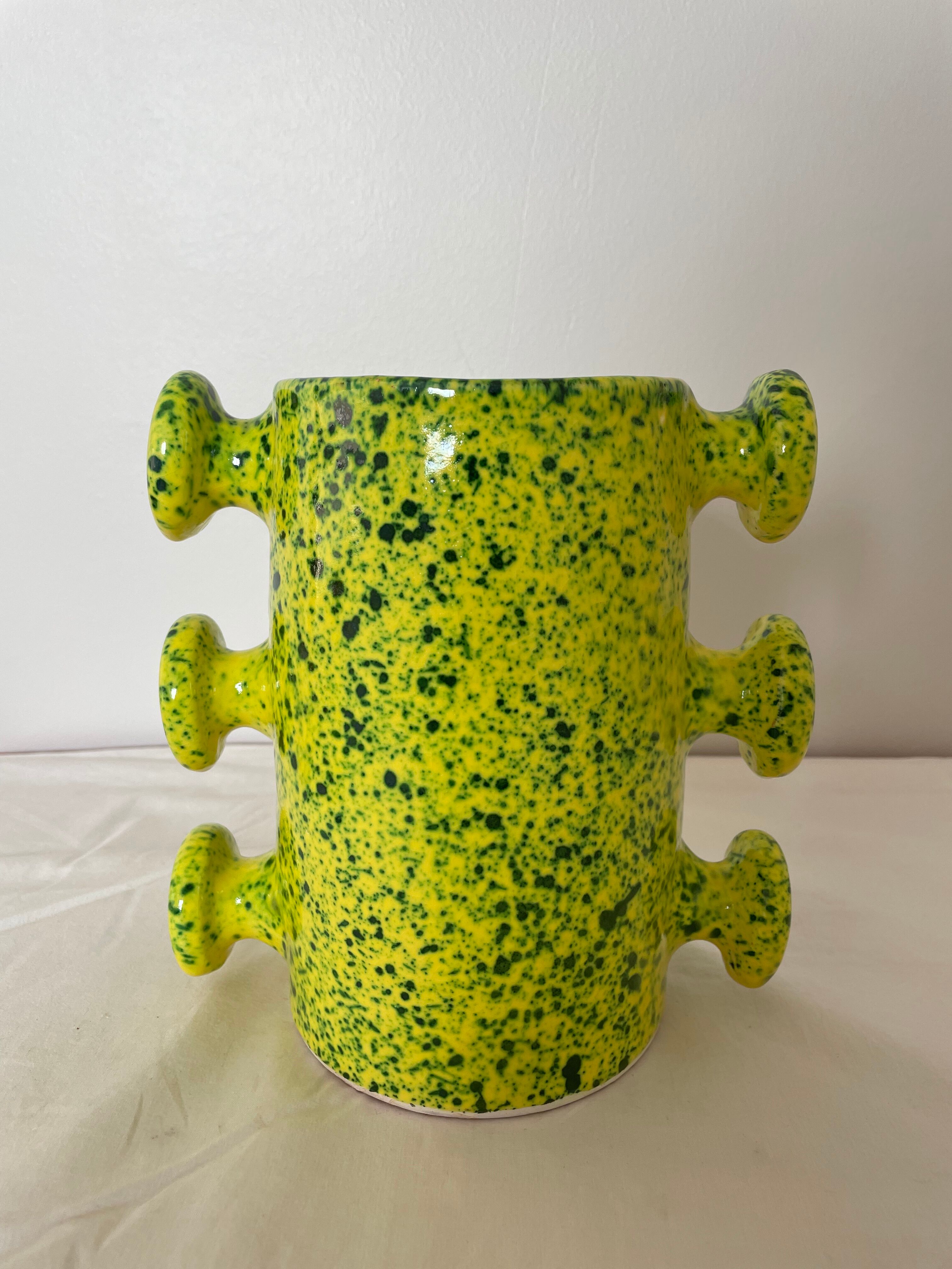 Handmade green speckled yellow ceramic vase with abstract handles