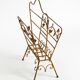 Extraordinary mid-century newspaper and magazine rack with a gilded metal