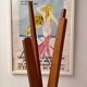 Designer teak coat rack