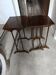 Stackable tables with pyrography.