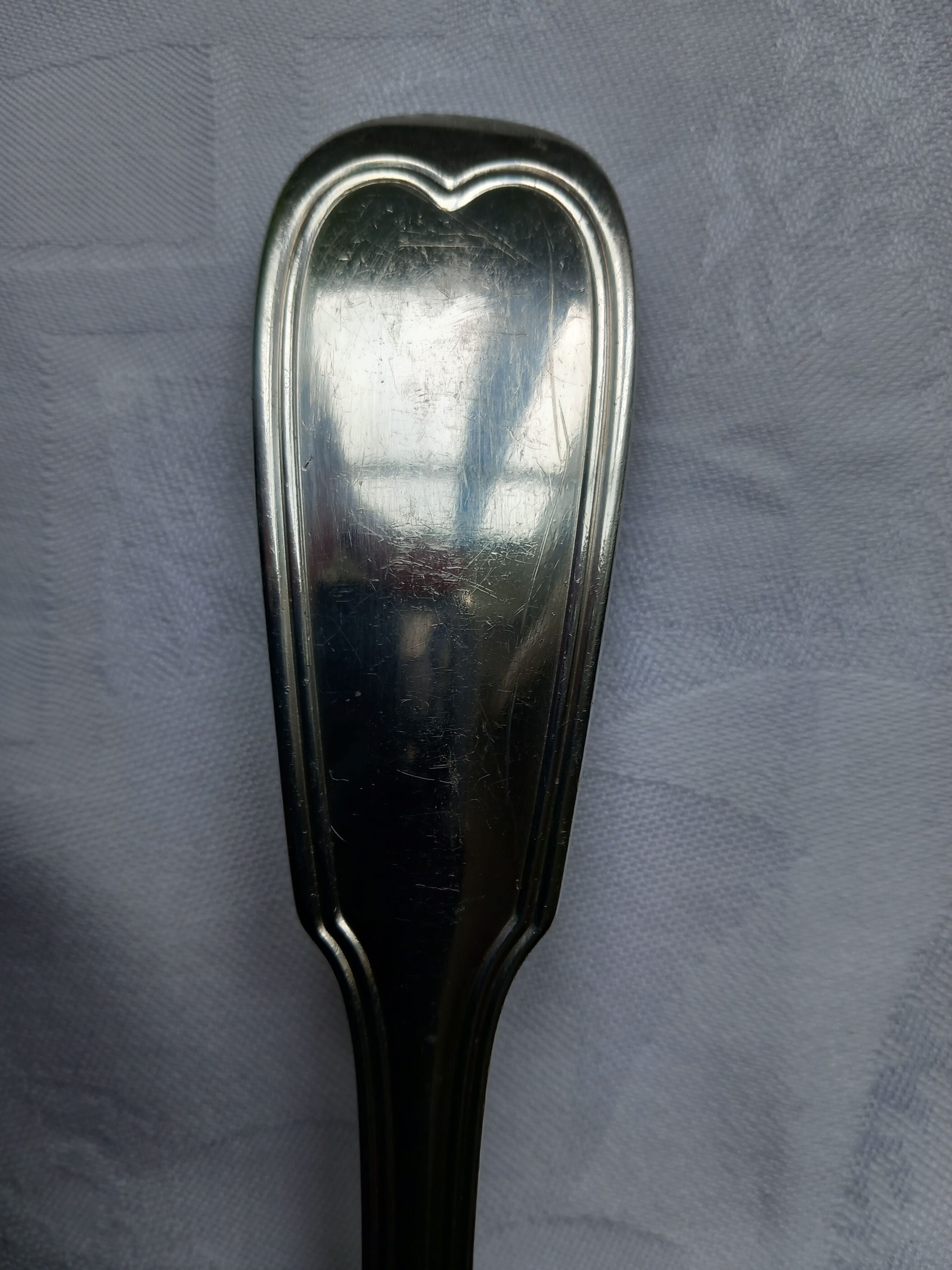 Silver metal ladle