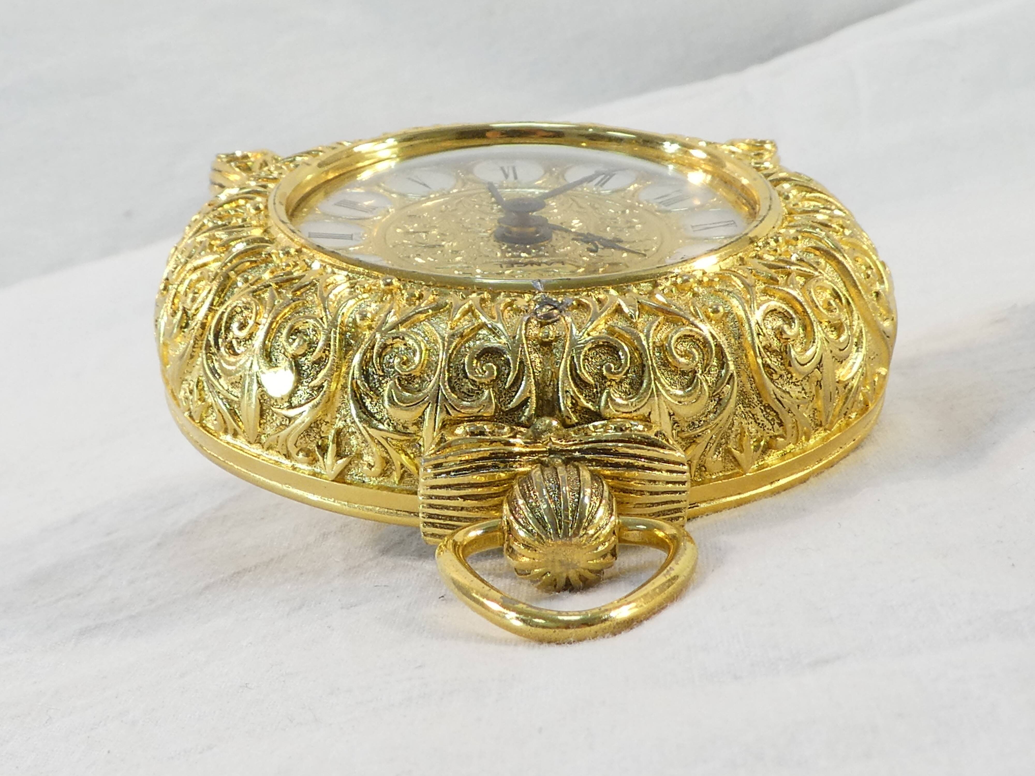 LANCEL alarm clock in chiseled bronze and gilded metal