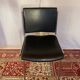 Vintage chair in black faux leather and chrome metal
