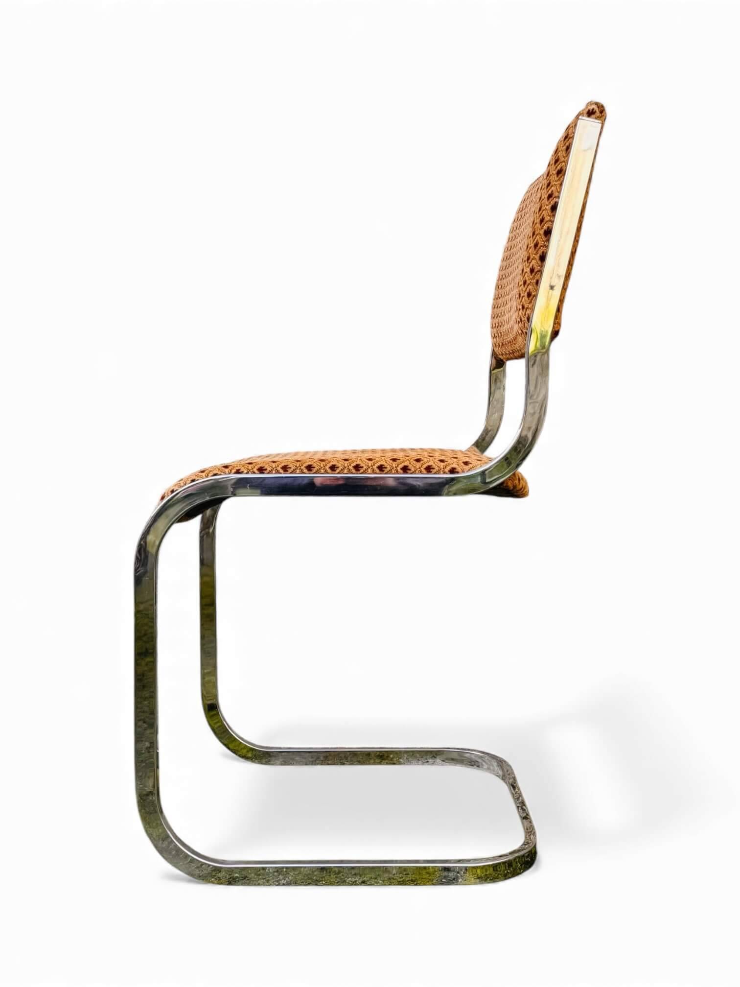 Set of 4 vintage sled chairs from the 1970s