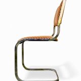 Set of 4 vintage sled chairs from the 1970s