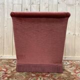 Fauteuil style crapaud en velours rose capitonné