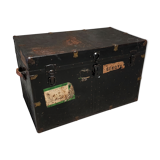 Riveted metal travel trunk