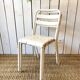 Pair of white metal bistro chairs
