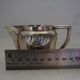 Teapot and milk jug English silverware