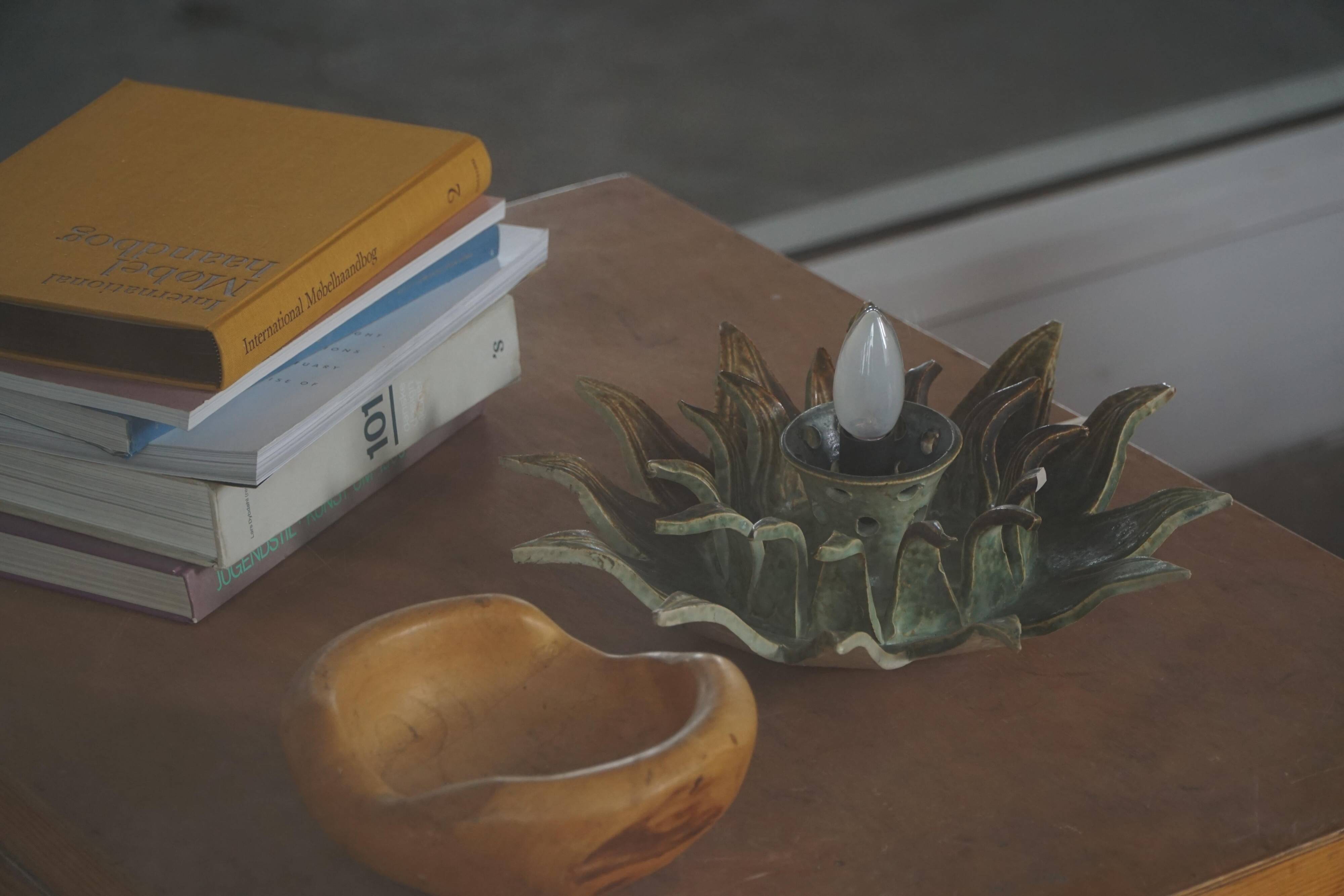 Mid-20th century ceramic sun wall lamp or decorative wall sculpture, 1960s.