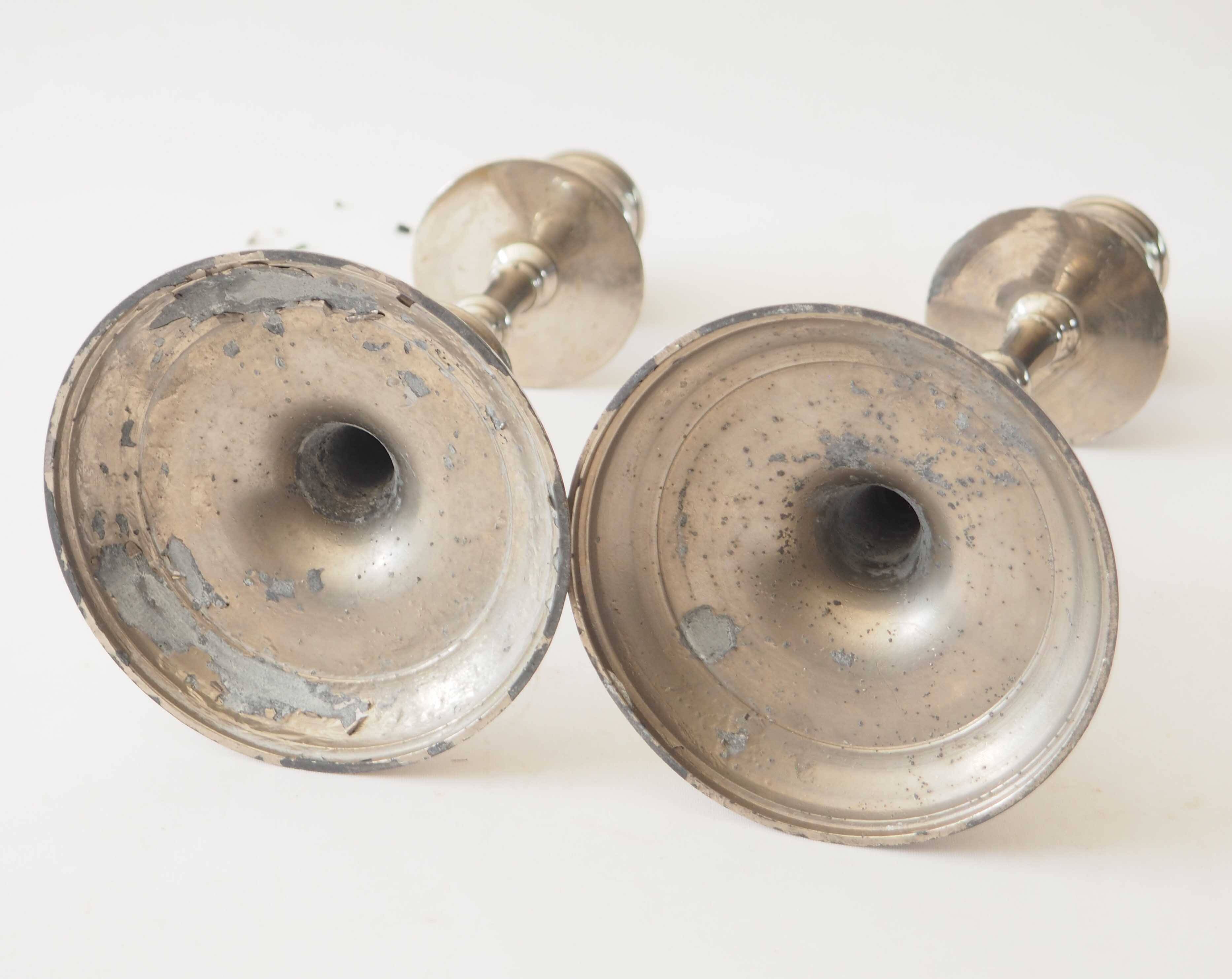 Pair of metal candlesticks