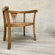 Old armchair for children in wood