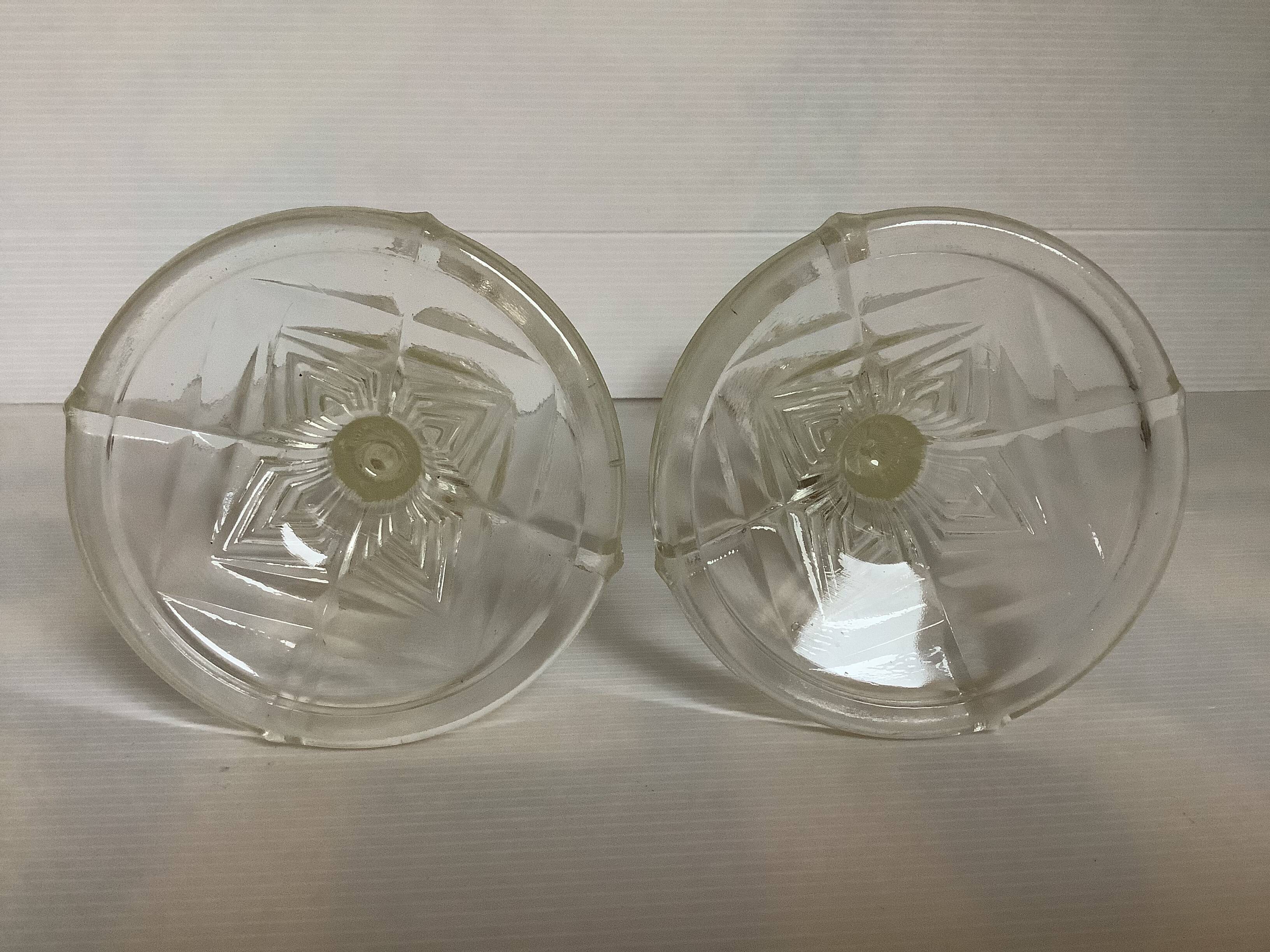 Pair of geometric art deco molded glass candlesticks