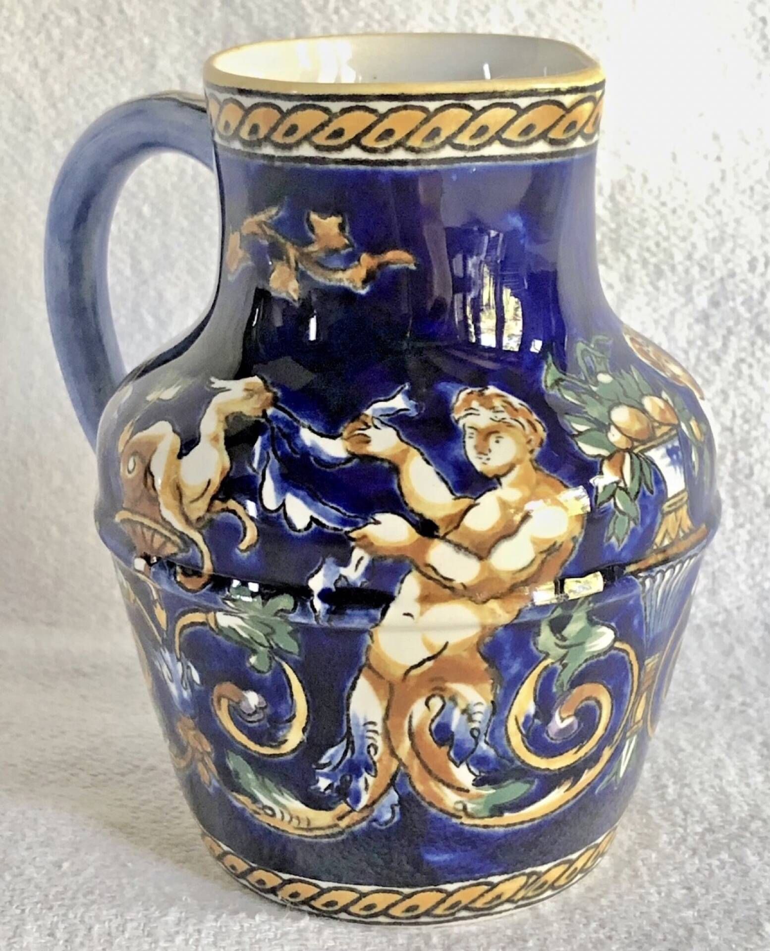 Old cream jug Gien Renaissance blue background 1938/1960