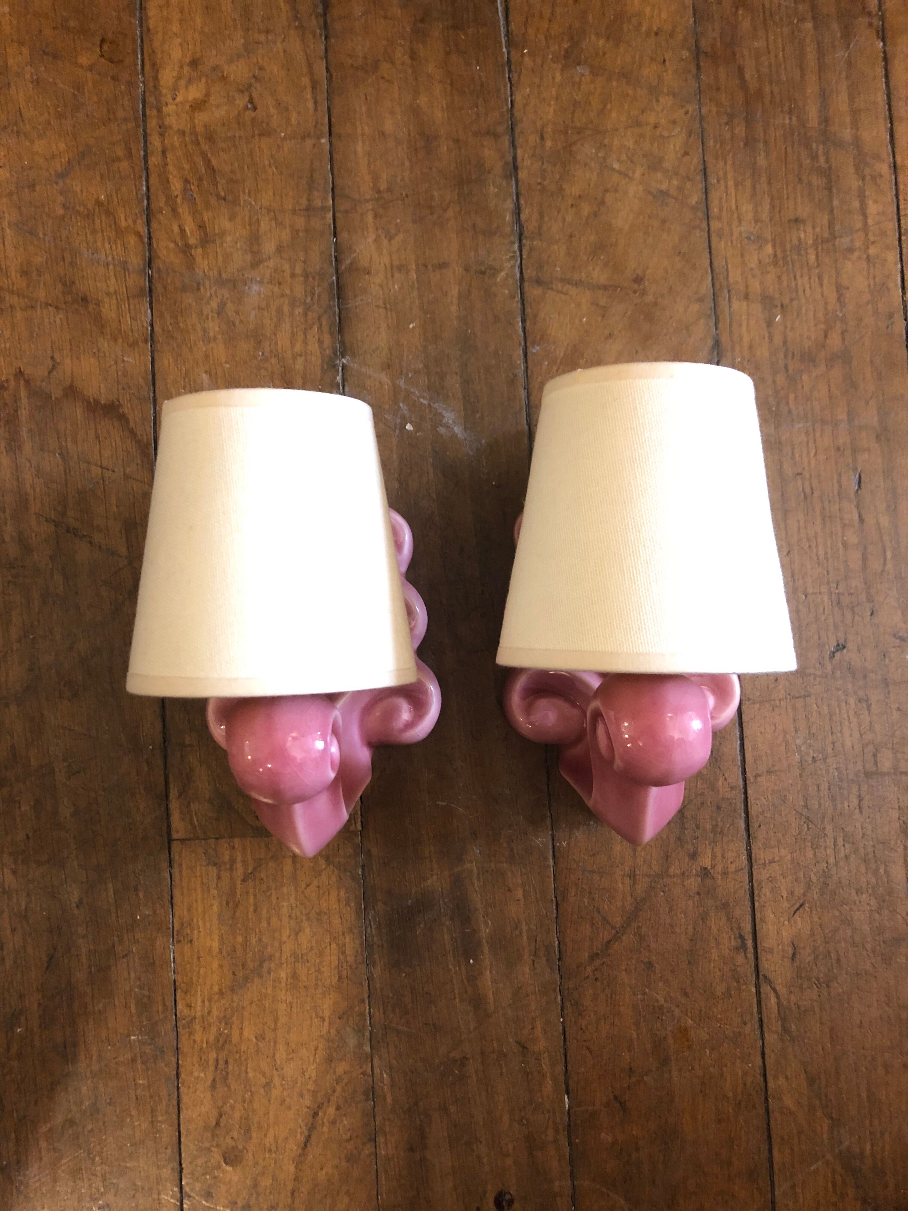 Pair of earthenware palmette wall lamps, 1950s