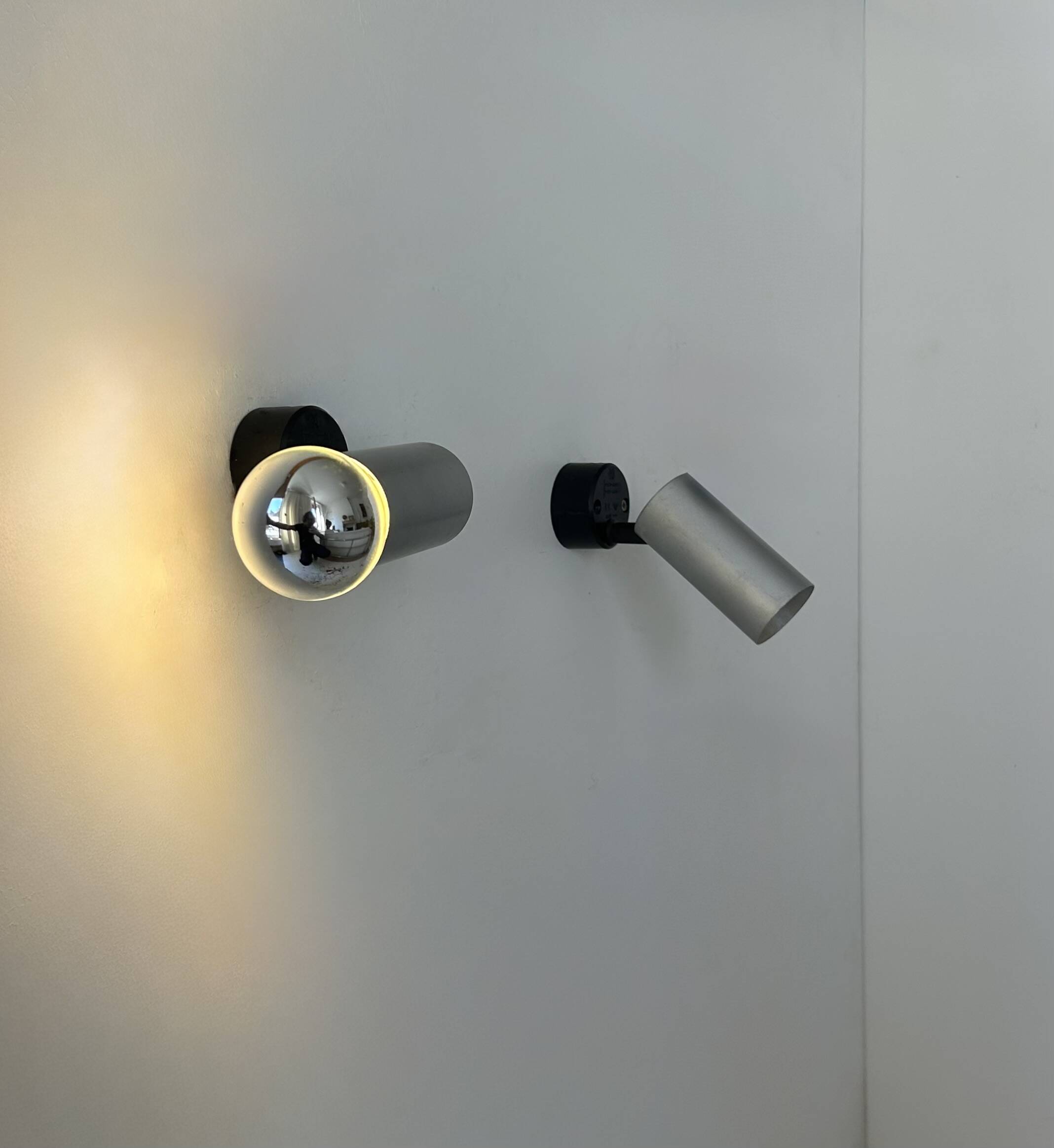 Pair of vintage adjustable brushed aluminum wall lights, France, 1970s