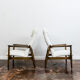 Pair of white boucle gfm 64 high back armchairs by edmund homa, 1960s