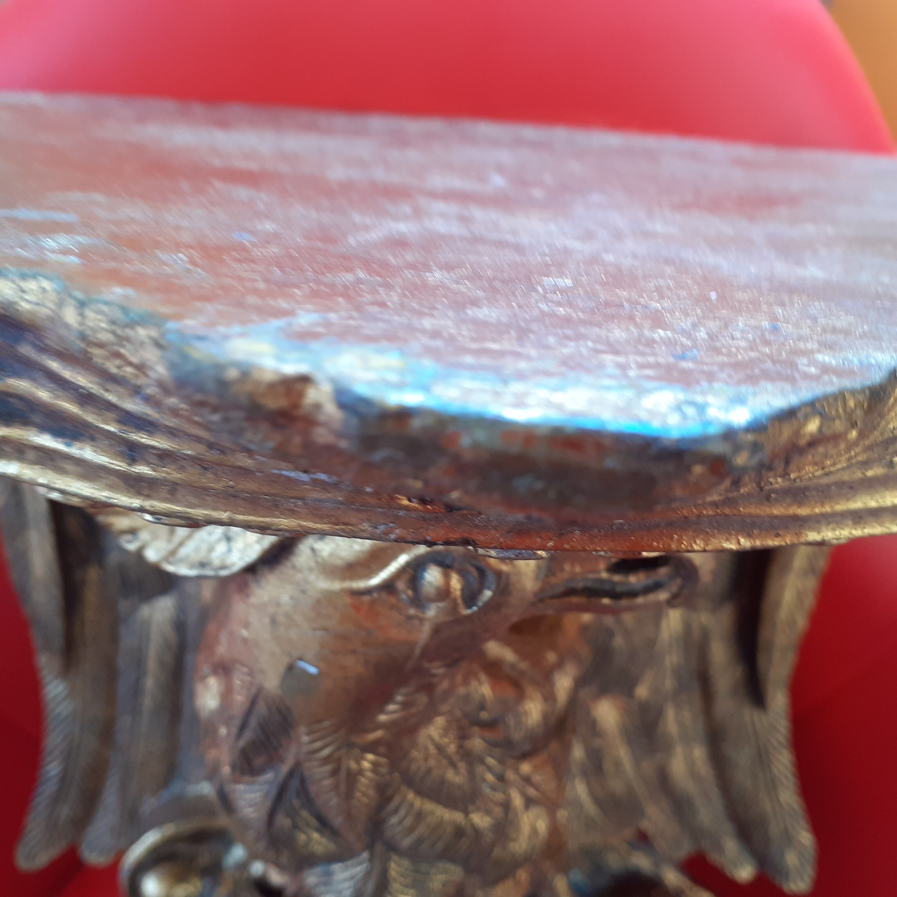 Golden wall shelf, eagle motif