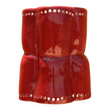 Sculptural wall light in burgundy ceramic
