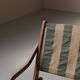 Foldable chair in solid wood and striped fabric, circa 1900.