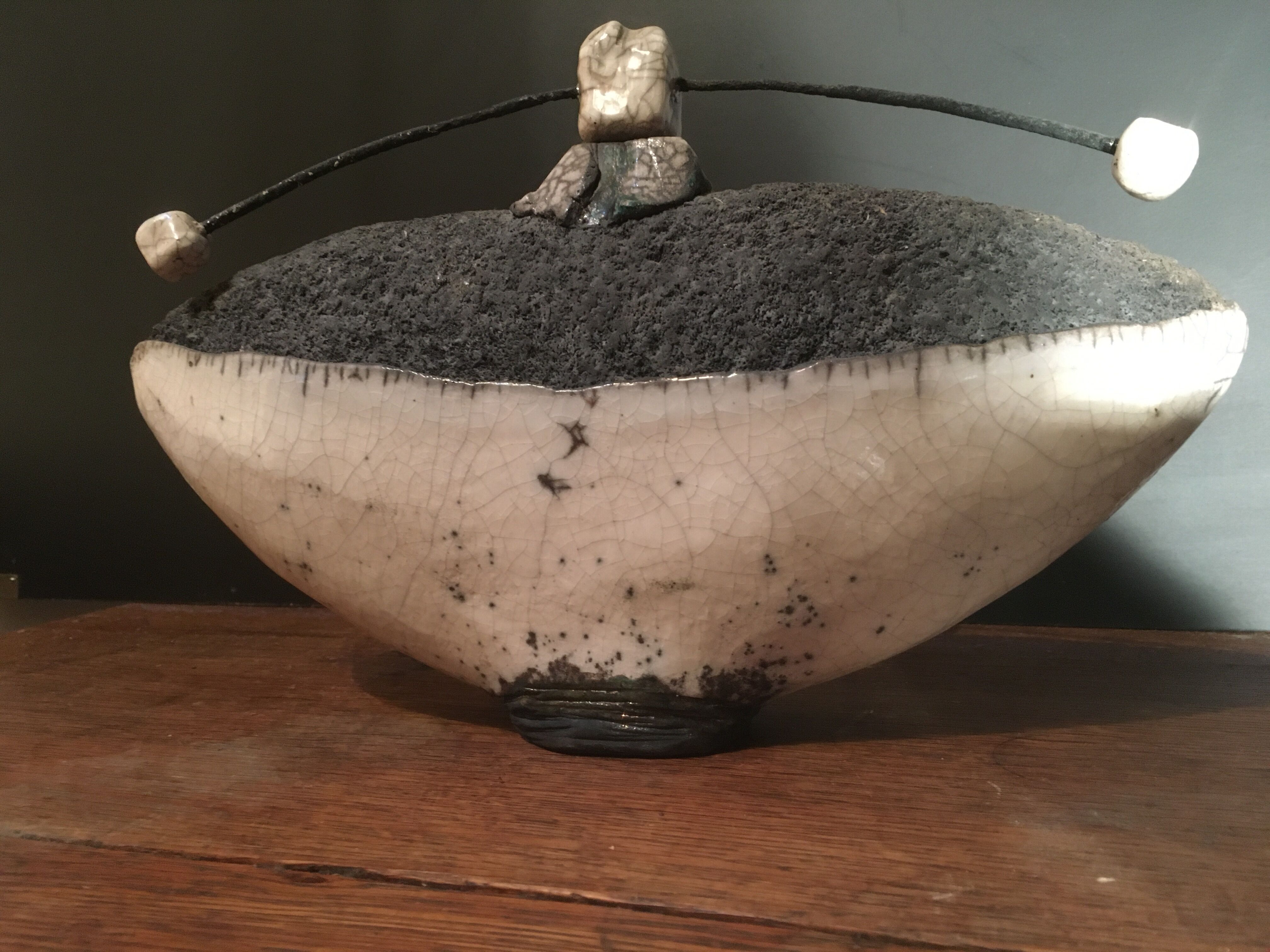 Enamelled ceramic bottle signed