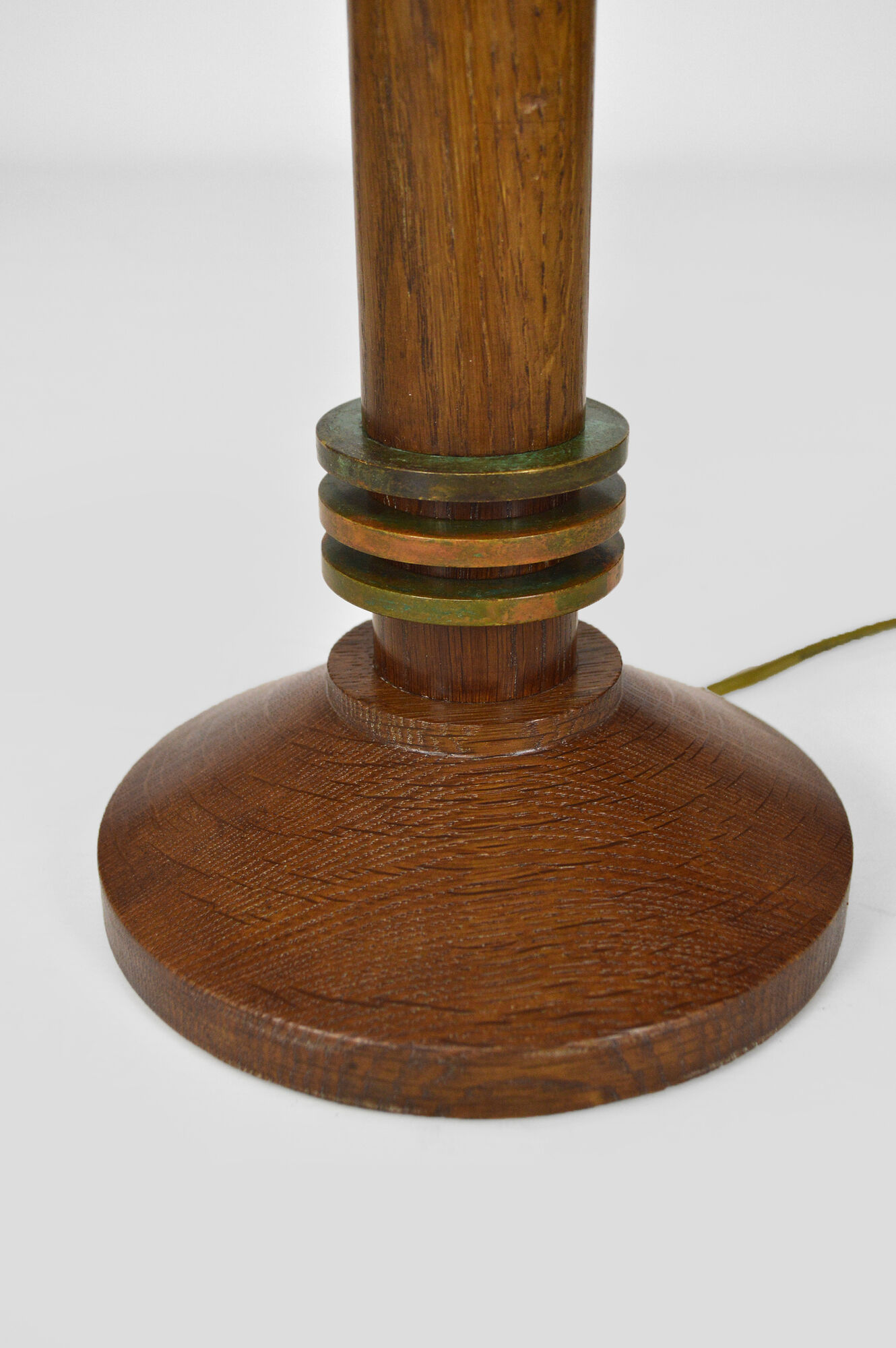 Pair of art deco lamps in wood and patinated bronze around 1930