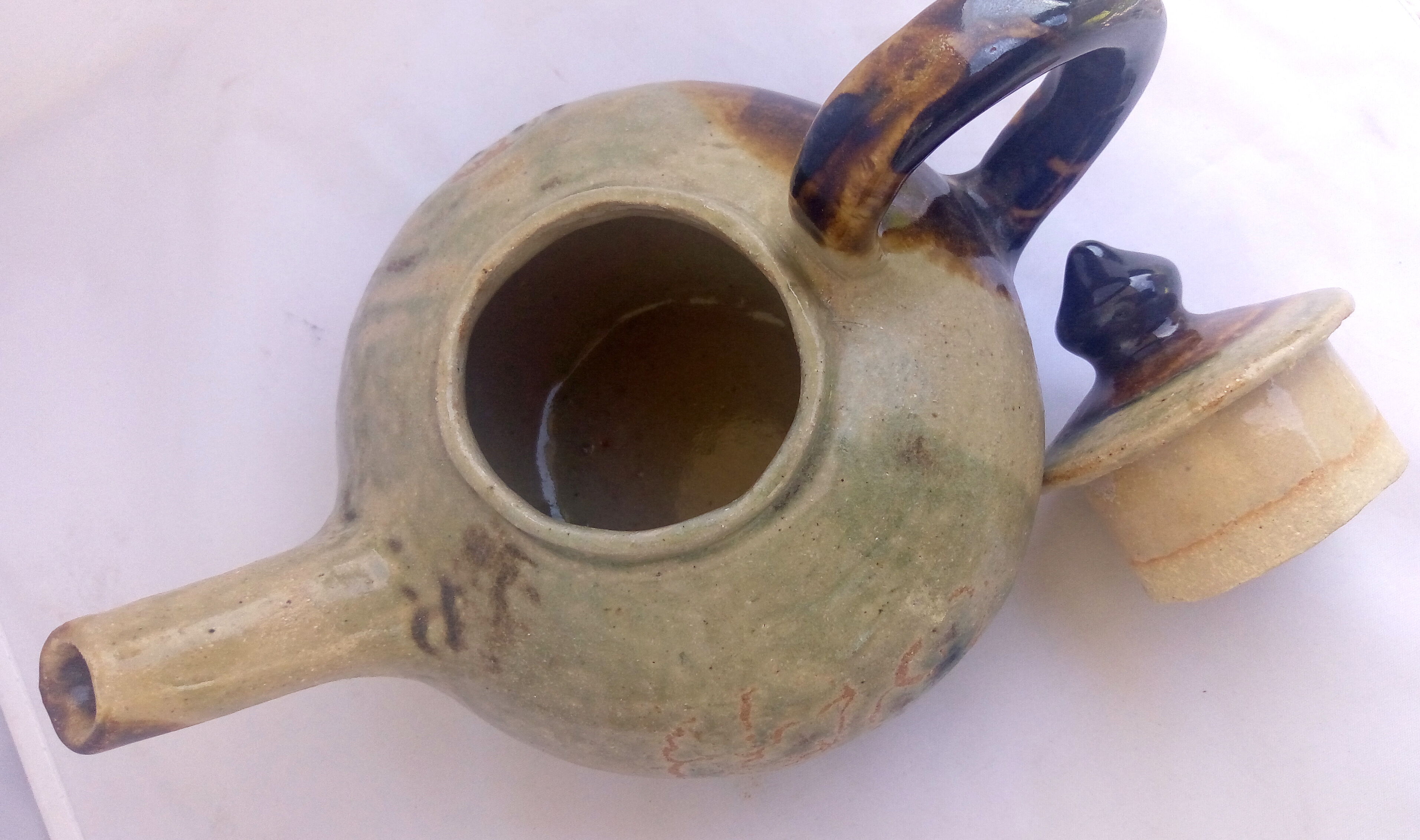 Rustic enamelled sandstone teapot