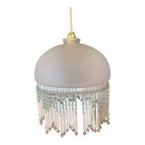 Globe pendant with pink tassels