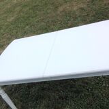 White farmhouse table set and four chairs