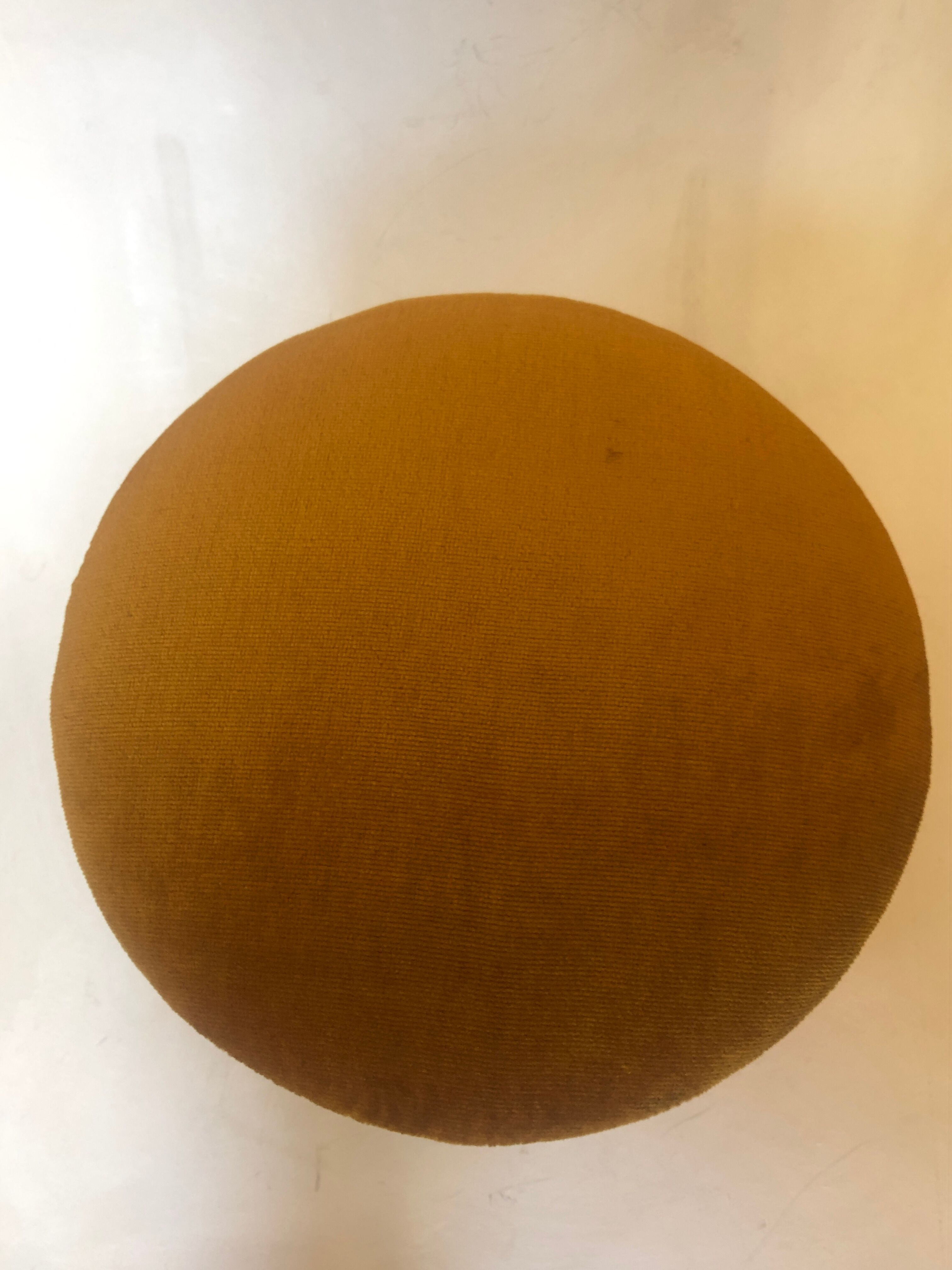 Velvet and fringed ottoman